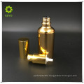 best selling cosmetic container gold glass bottle